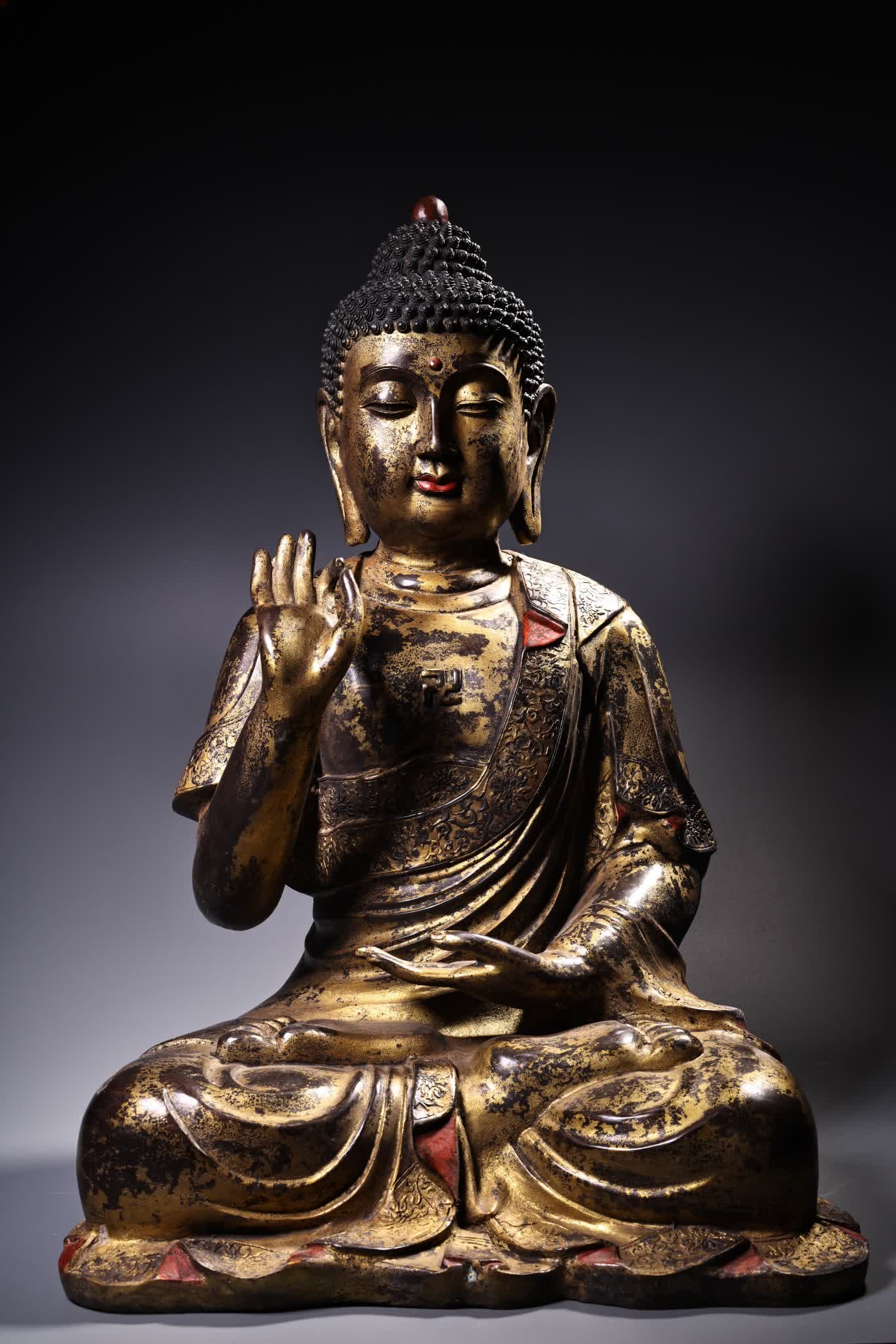 A Qing Dynasty gilded Shakyamuni Buddha statue (1 of 13)