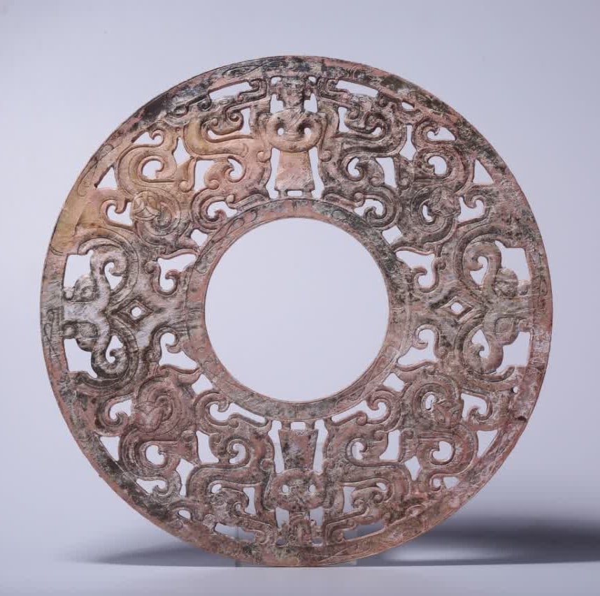 A jade bi disk with ancient jade carved figurines and dragon patterns (1 of 8)
