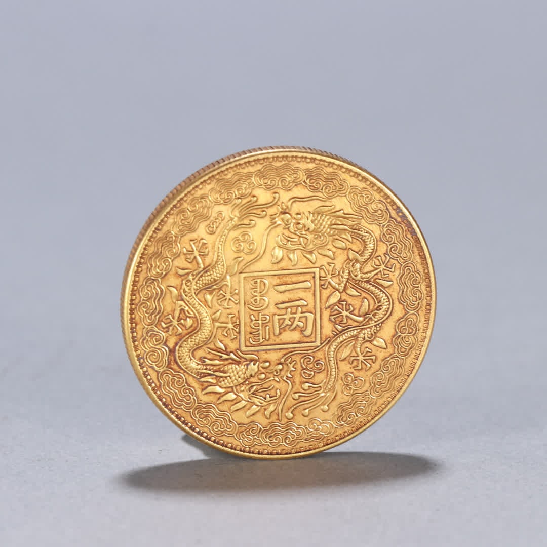 One Qing dynasty silver gilt double dragon motif "One Liang" coin (1 of 6)