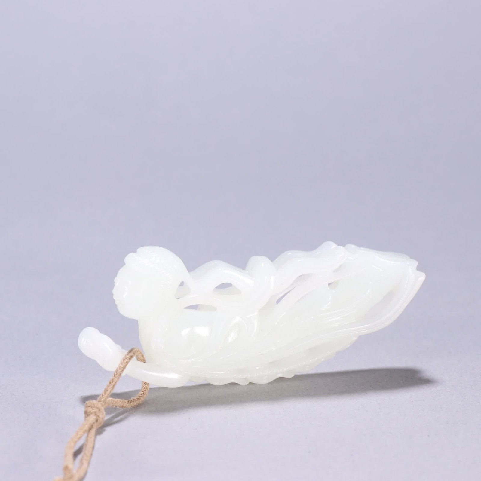 A Qing dynasty Hetian jade flying apsaras carving (1 of 9)