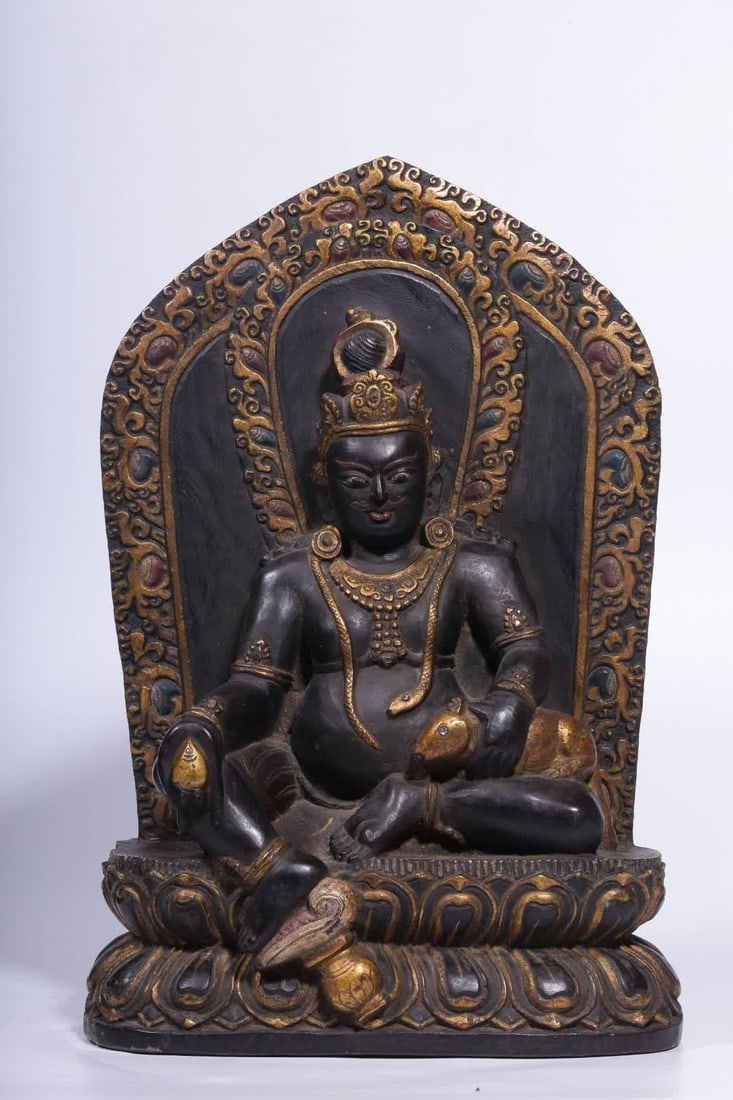 A Qing Dynasty black stone lacquered golden seated statue of the God of Wealth: A seated statue of the God of Wealth in black stone lacquer and golden yellow from the Qing Dynasty SIZE: H:30.5cm L:21cm W:9.5cm W:5.6kg (The Dimensions Of All Batches Are Manually Measured.If You Ne