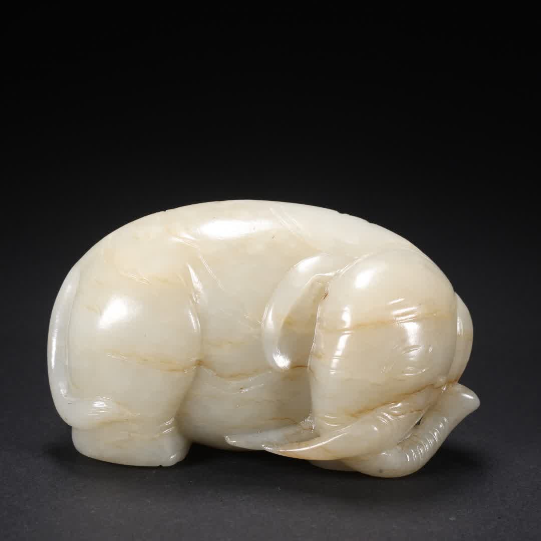 A Qing Dynasty Hetian jade with a symbol of peace (1 of 9)