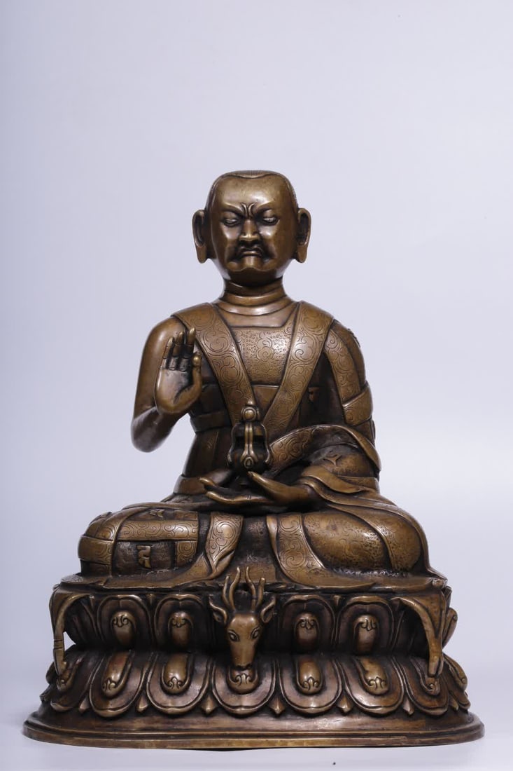 A Qing Dynasty alloy bronze statue of Master Marpa: A statue of the Guru Marpa made of alloy from the Qing Dynasty SIZE: H:29.5cm L:24.5cm W:19.5cm W:5.05kg (The Dimensions Of All Batches Are Manually Measured.If You Need More Detailed Information, Ple