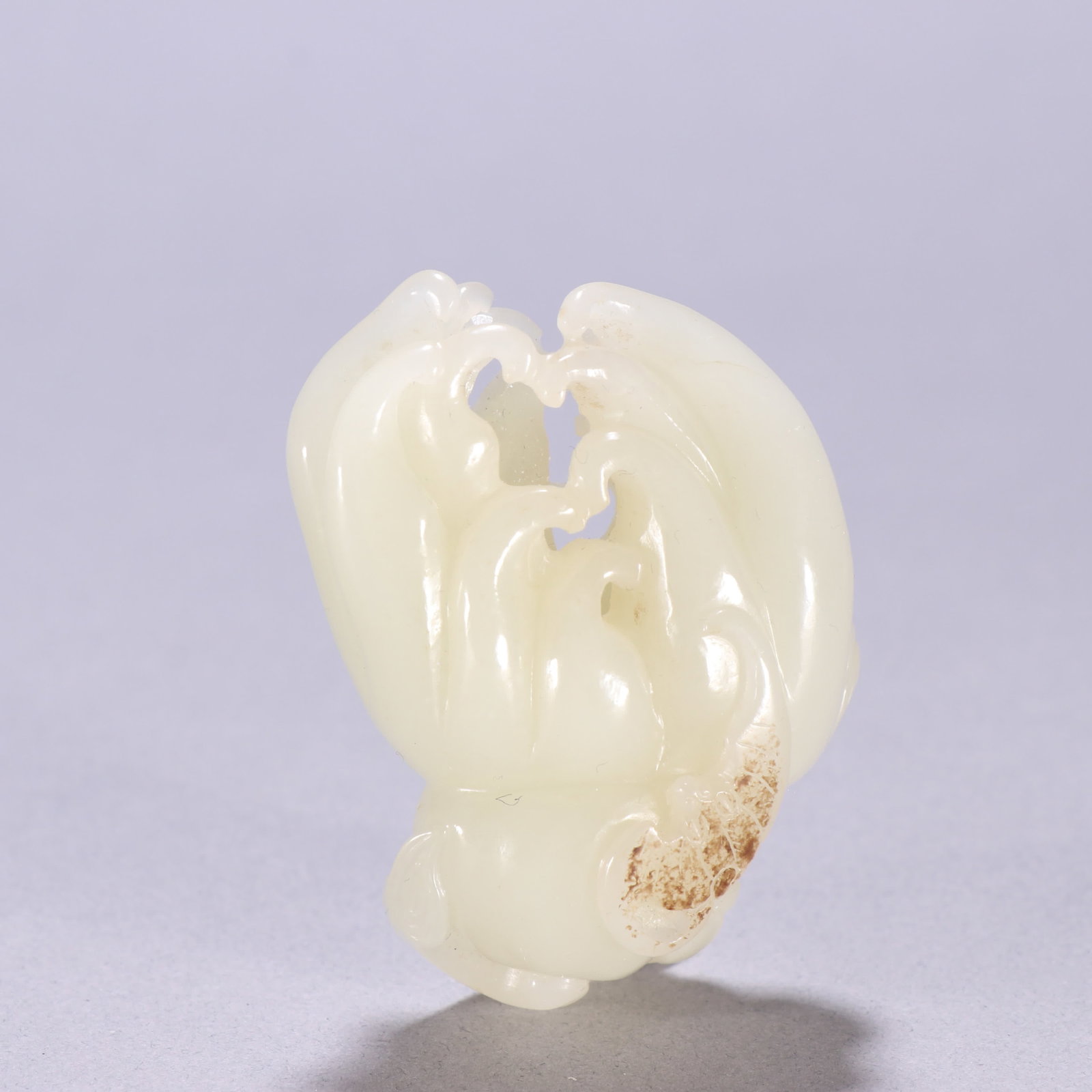 A hand-carved jade Buddha from Hetian during the Qing Dynasty (1 of 9)