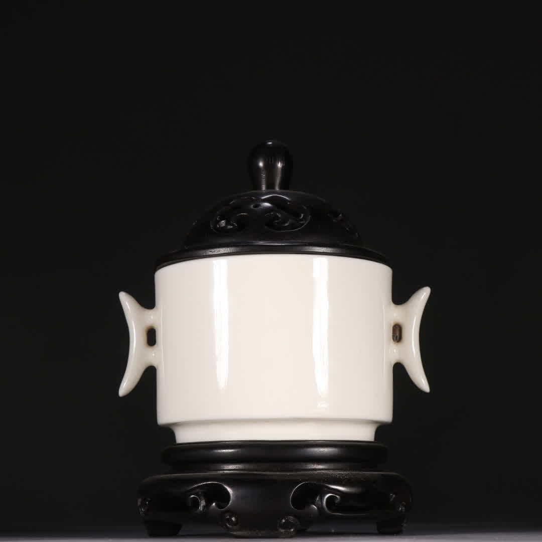 A Qing Dehua white porcelain double-halberd-handled incense burner: Qing Dynasty Dehua White Porcelain Double-Halberd Ear Incense Burner SIZE: H:15cm W:11.2cm (The Dimensions Of All Batches Are Manually Measured.If You Need More Detailed Information, Please Contact Ou