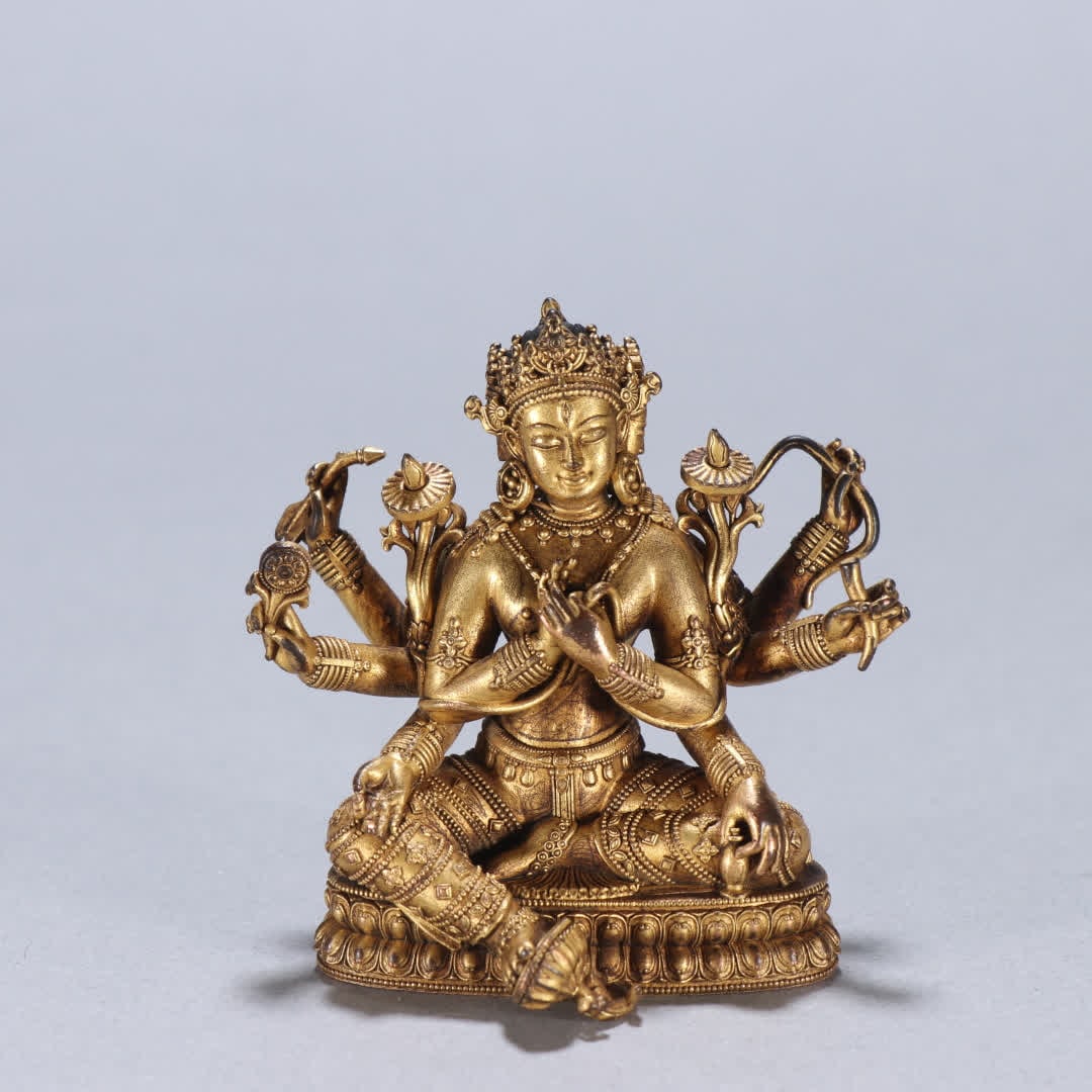A Qing dynasty bronze gilt six-armed Tara statue (1 of 9)