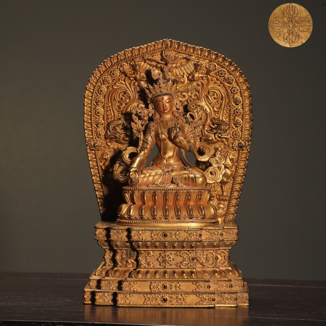 A Ming Dynasty bronze-plated gilded white seated Tara statue: Ming Dynasty bronze-inlaid gilded white seated Tara statue SIZE: H:18.8cm W:12.3cm W:1250g (The Dimensions Of All Batches Are Manually Measured.If You Need More Detailed Information, Please Contact Ou