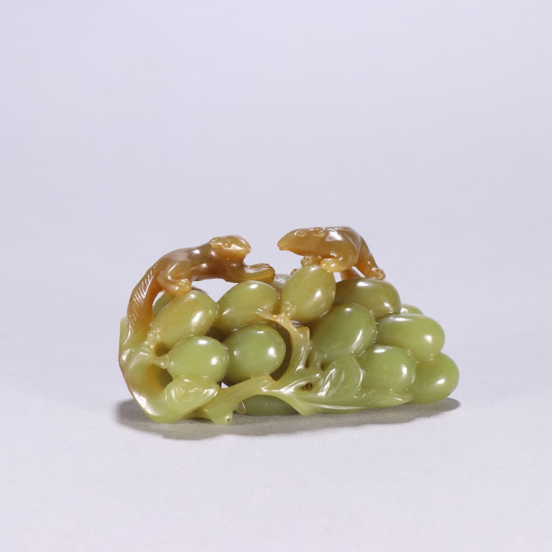 A Qing dynasty Hetian yellow jade squirrel grape carving (1 of 9)