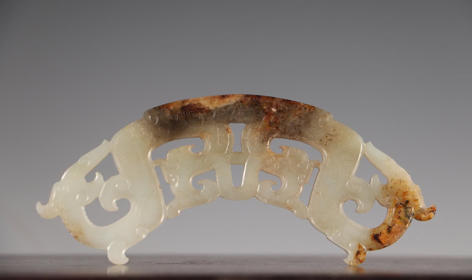 A Qing Dynasty Hetian jade inlaid with openwork carved double dragon patterns: Qing Dynasty Hetian jade inlaid with transparent carved double dragon patterns SIZE: 12x3.3x0.5cm W:44.3g (The Dimensions Of All Batches Are Manually Measured.If You Need More Detailed Information, Pl