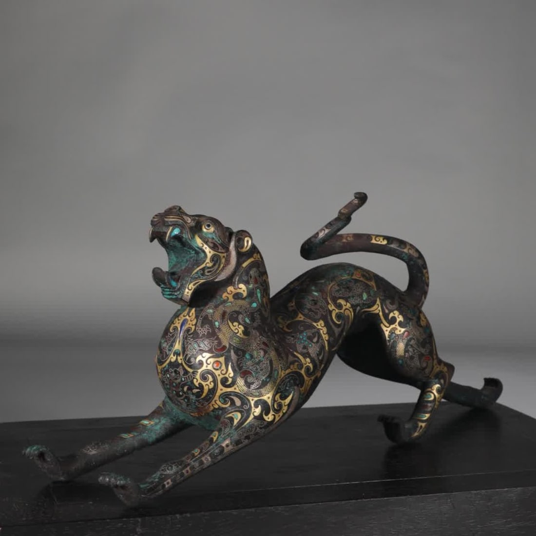 A Warring States period bronze inlaid with gold and silver chihu (1 of 9)