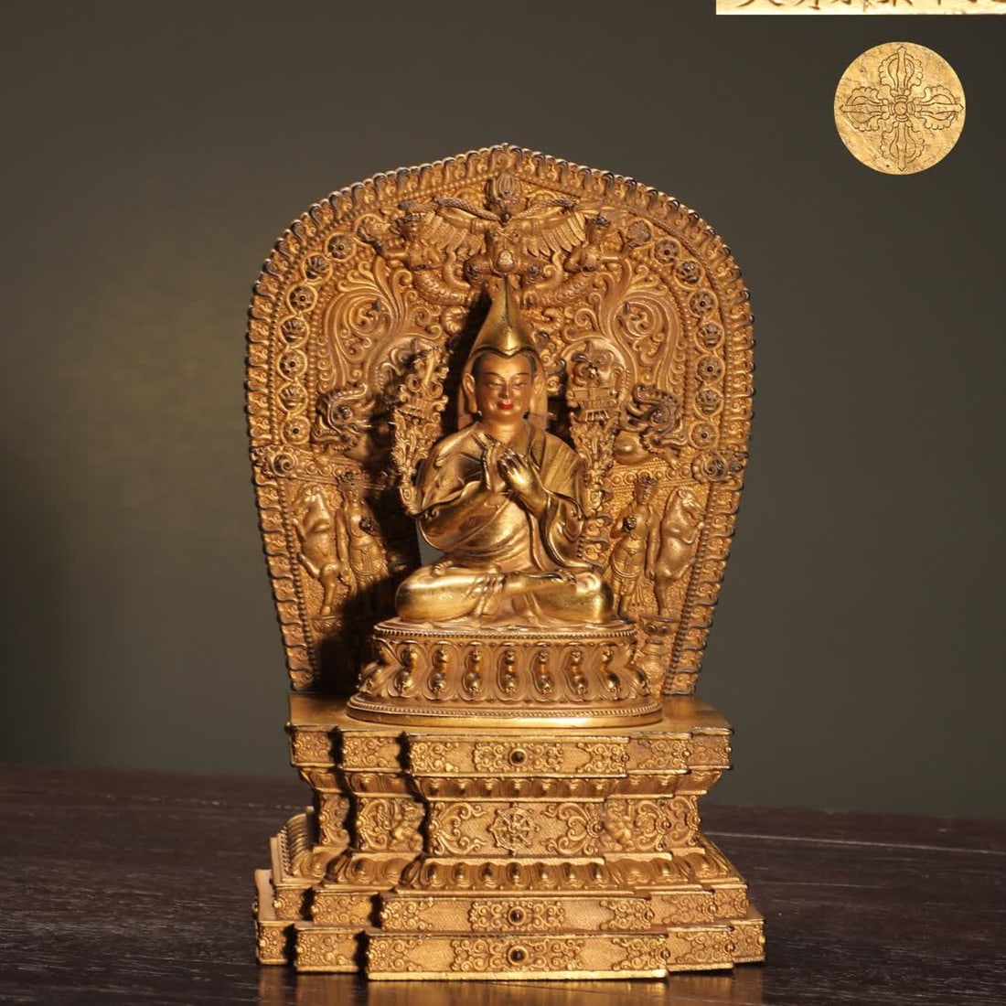 A Ming Dynasty gilded bronze statue of Tsongkhapa disciple Jia Caojie: Ming Dynasty gilded bronze statue of Tsongkhapa disciple Jia Caojie seated SIZE: H:18.8cm W:12.3cm W:1250g (The Dimensions Of All Batches Are Manually Measured.If You Need More Detailed Information, P