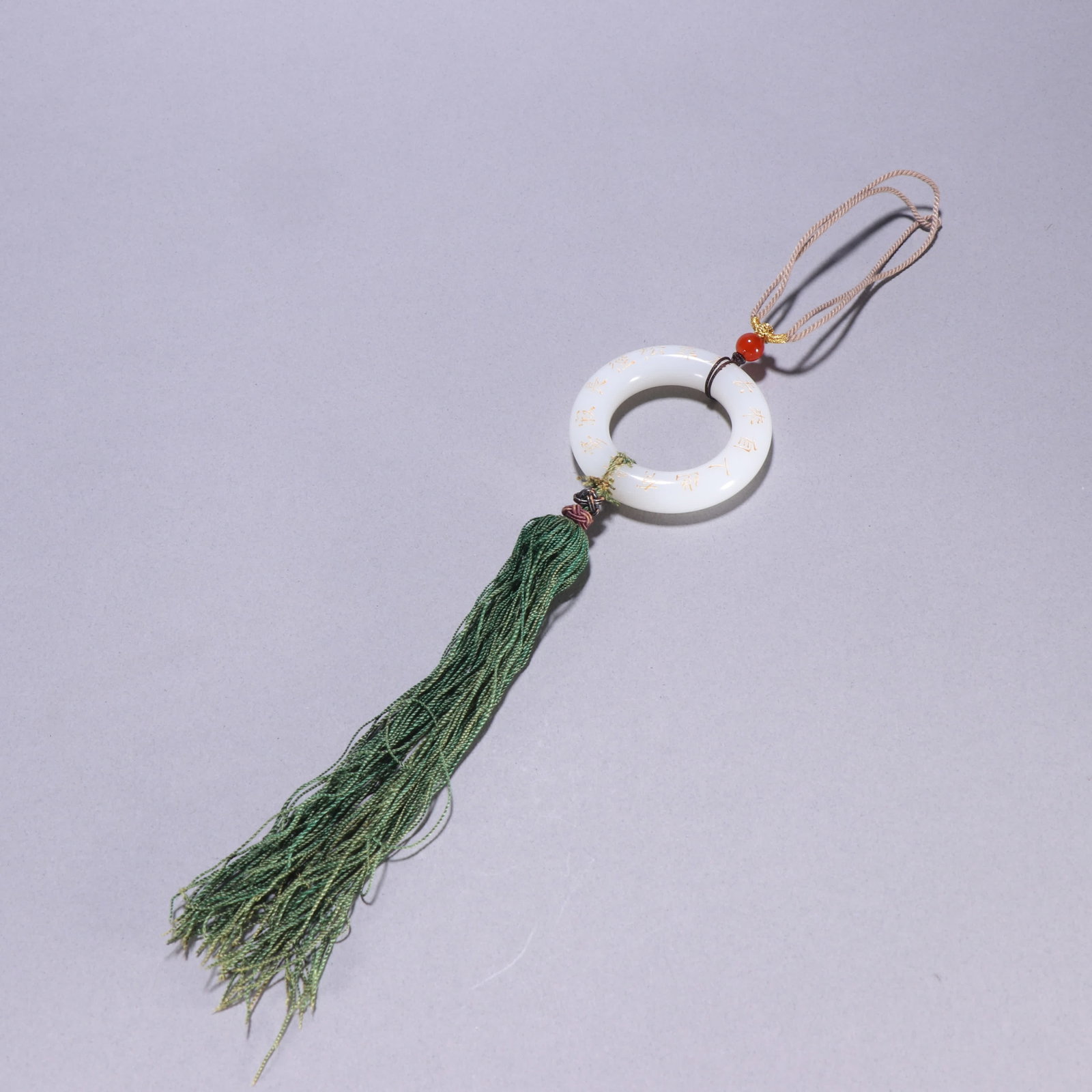 A Qing dynasty Hetian jade pendant with gold-painted poetry and prose rings (1 of 9)