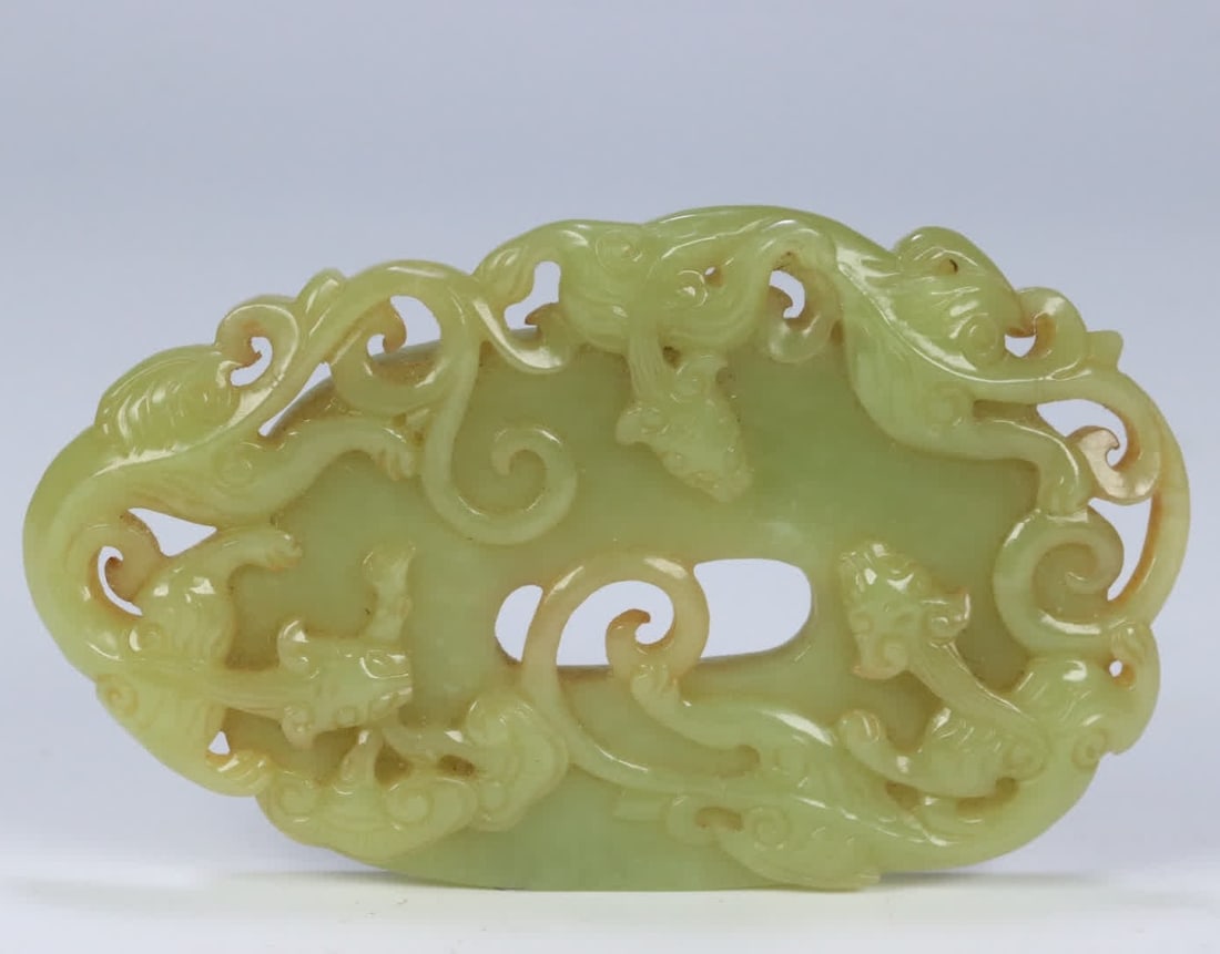A Qing Dynasty Hetian yellow jade bi with chi dragon patterns: Qing Dynasty Hetian yellow jade bi with dragon patterns SIZE: 11.58x7.03x1.33cm W:161g (The Dimensions Of All Batches Are Manually Measured.If You Need More Detailed Information, Please Contact Our Cu