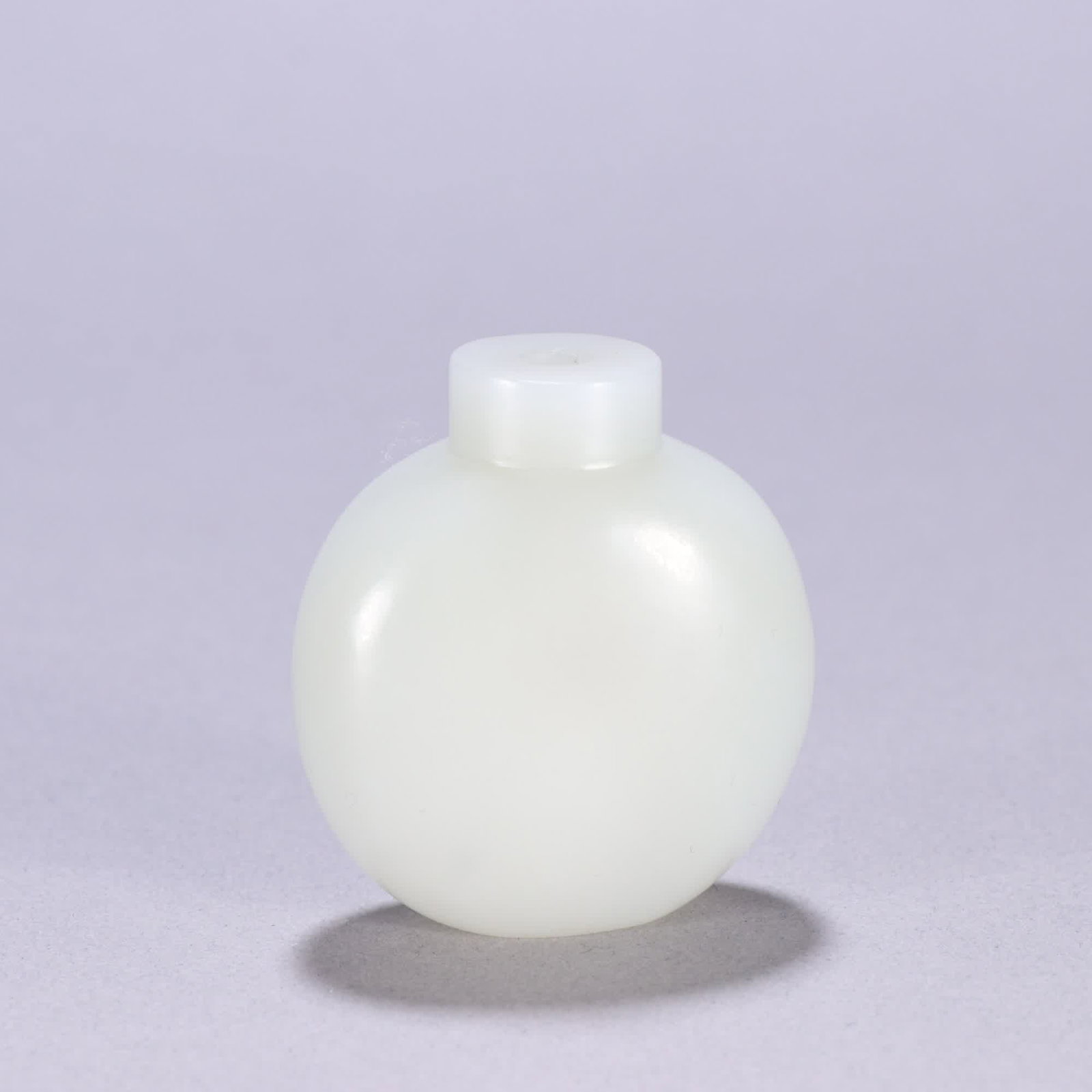 A Qing Hetian jade seed material snuff bottle: Qing Dynasty Hetian jade seed material snuff bottle SIZE: H:5.1cm W:4.5cm W:60g (The Dimensions Of All Batches Are Manually Measured.If You Need More Detailed Information, Please Contact Our Customer 