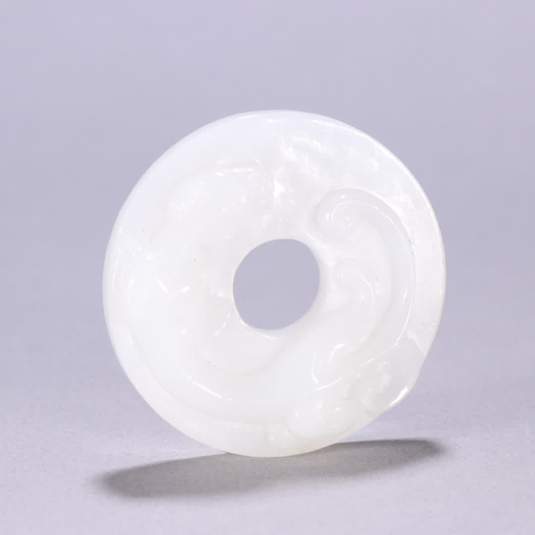 A Qing Dynasty Hetian jade bi with dragon patterns: Qing Dynasty Hetian jade chi dragon pattern bi SIZE: W:5.6cm W:48.9g (The Dimensions Of All Batches Are Manually Measured.If You Need More Detailed Information, Please Contact Our Customer Service Bef