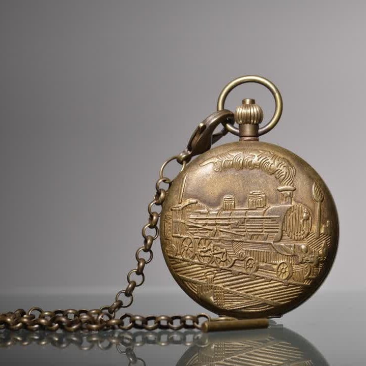A 19th-century copper bas-relief pocket watch with a steam engine and a double-opening mechanism: Nineteenth century: Copper relief steam engine double-opening pocket watch SIZE: D:55mm (The Dimensions Of All Batches Are Manually Measured.If You Need More Detailed Information, Please Contact Our C
