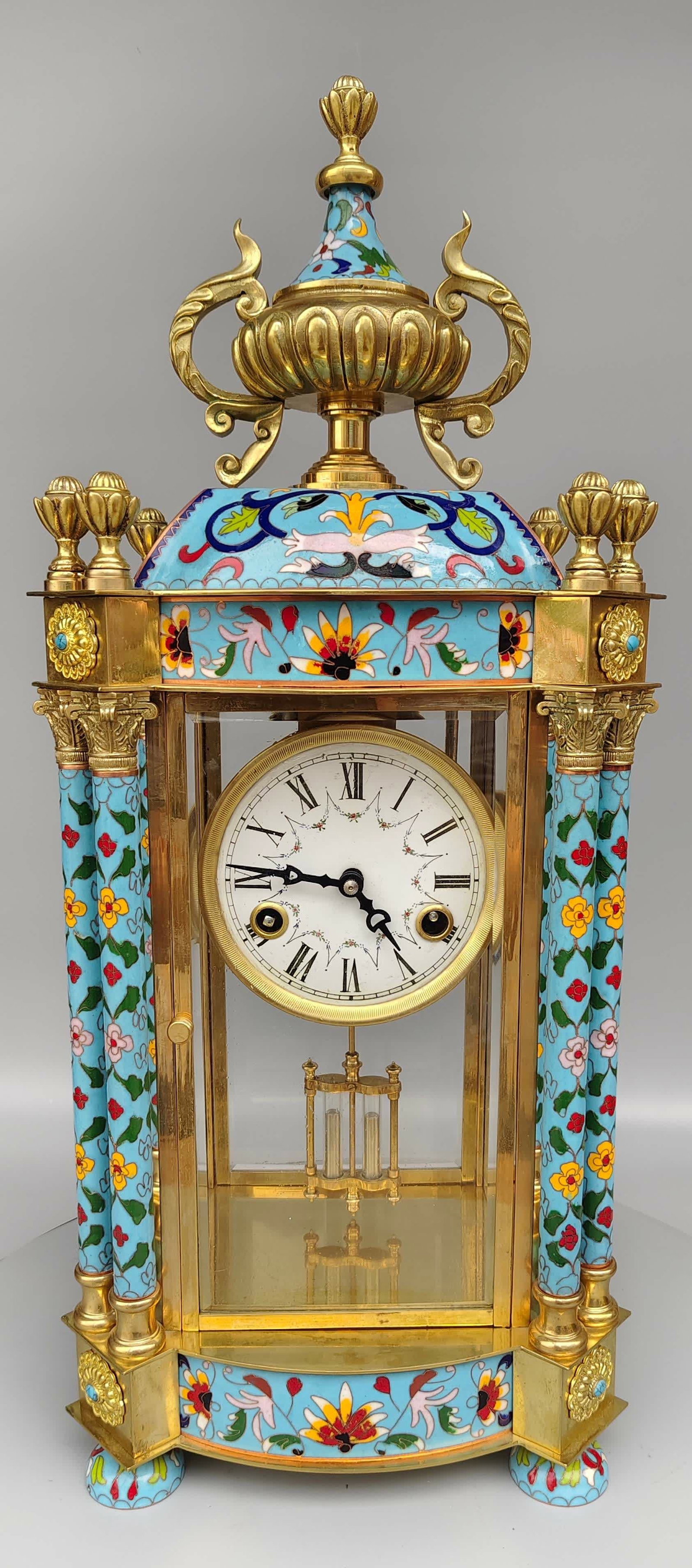 A late Qing cloisonnee enamel mechanical clock: Late Qing cloisonne enamel mechanical clock SIZE: 56x25x18cm (The Dimensions Of All Batches Are Manually Measured.If You Need More Detailed Information, Please Contact Our Customer Service Before Bidd