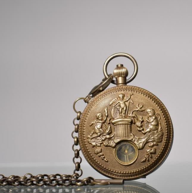 A nineteenth-century bronze angel and Holy Spirit pocket watch: Nineteenth century: Bronze Angel Holy Spirit double-opening pocket watch SIZE: D:55mm (The Dimensions Of All Batches Are Manually Measured.If You Need More Detailed Information, Please Contact Our Cus