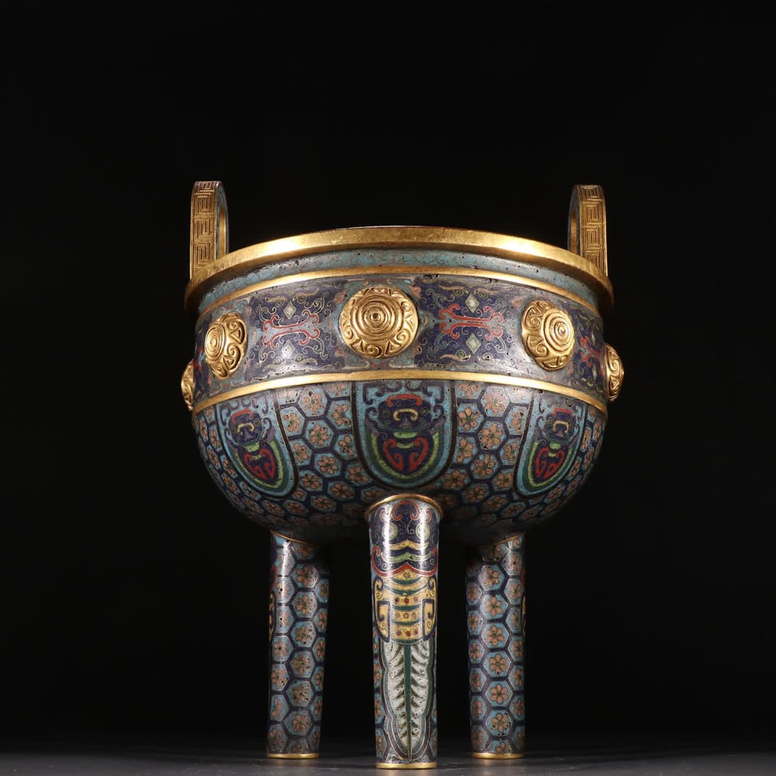 A Qing Dynasty bronze gilt cloisonne three-legged incense burner: Qing Dynasty gilt bronze cloisonne three-legged incense burner SIZE: H:28.2cm W:21cm W:2470.8g (The Dimensions Of All Batches Are Manually Measured.If You Need More Detailed Information, Please Contac