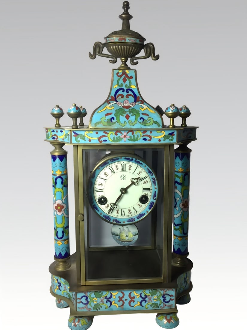 A late Qing dynasty bronze-bodied cloisonne enamel hand clock: Late Qing dynasty copper-bodied cloisonne enamel hand clock SIZE: 265x155x520mm Weight: 6.5kg (The Dimensions Of All Batches Are Manually Measured.If You Need More Detailed Information, Please Contact