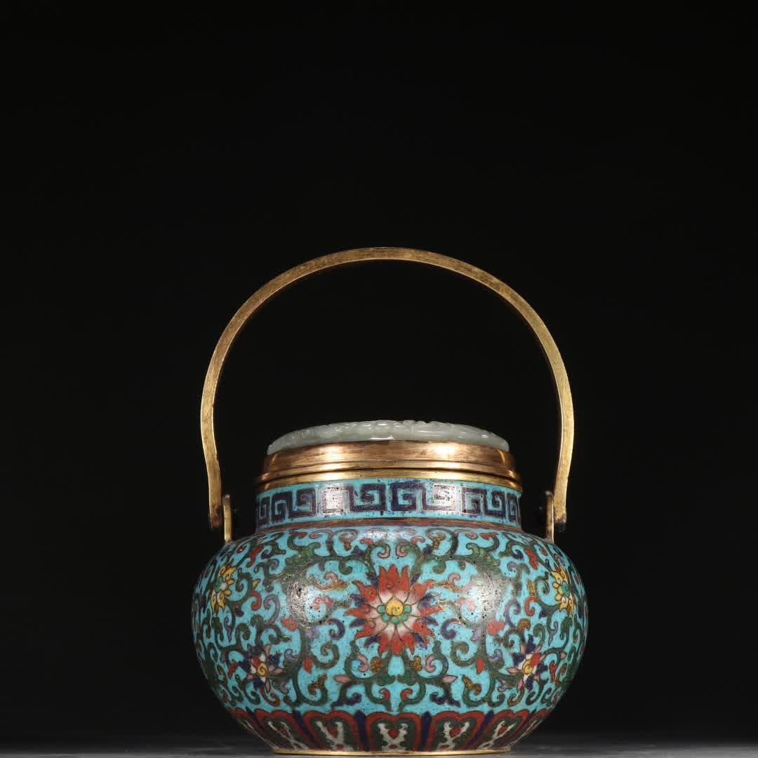 A Qing Dynasty copper gilt cloisonne inlaid with Hetian jade with entwined floral patterns: Qing Dynasty copper gilt cloisonne inlaid Hetian jade entwined floral pattern hand warmer SIZE: H:17.5cm W:11.8cm W:876.9g (The Dimensions Of All Batches Are Manually Measured.If You Need More Detaile