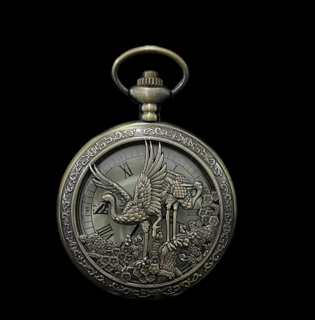 A Late Qinghe-relief double-opening pocket watch: In the late Qing, crane relief carvings open double-open pocket watches SIZE: D:45mm (The Dimensions Of All Batches Are Manually Measured.If You Need More Detailed Information, Please Contact Our