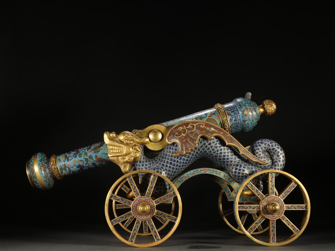 A Qing Dynasty gilded cloisonne cannon ornament: Qing Dynasty Gilded cloisonne cannon ornament SIZE: H:34.5cm W:50.2cm W:8.3kg (The Dimensions Of All Batches Are Manually Measured.If You Need More Detailed Information, Please Contact Our Customer Se