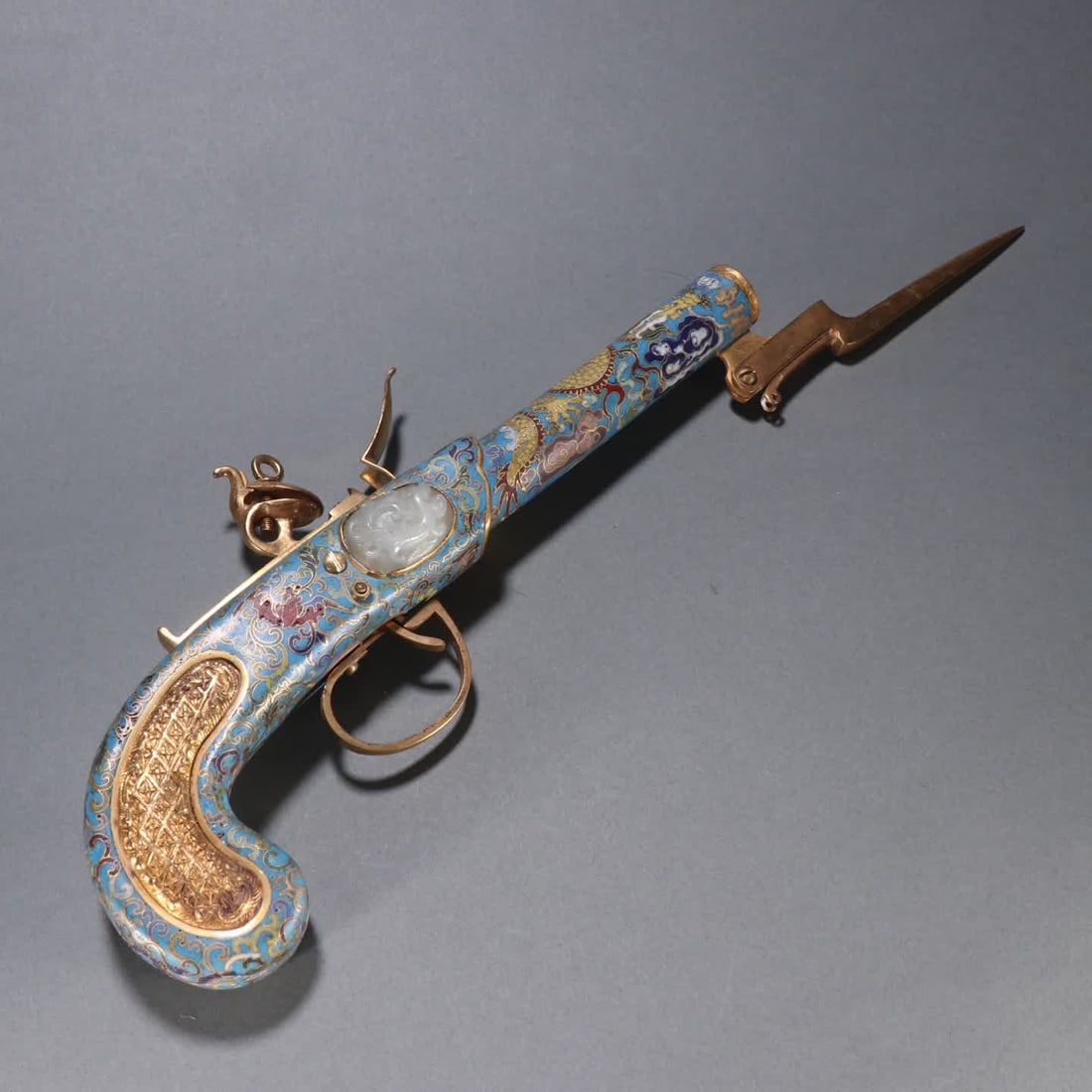 One piece: a gilt copper cloisonne inlaid jade firearm: Gilt bronze cloisonne inlaid jade flintlock gun SIZE: L:39.5W:12.3cm W:640g (The Dimensions Of All Batches Are Manually Measured.If You Need More Detailed Information, Please Contact Our Customer Serv