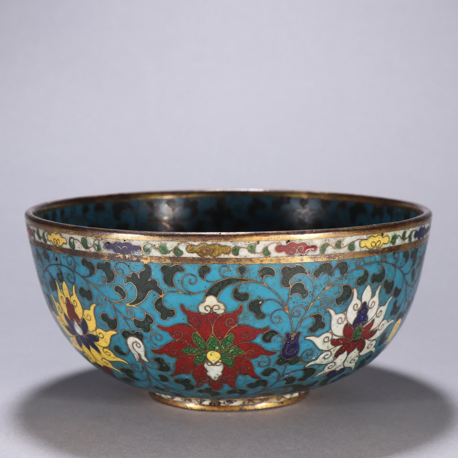 A Ming Dynasty bowl with a cloisonne lotus pattern on a bronze body: Ming Dynasty bronze-bodied cloisonne lotus pattern bowl SIZE: H:6.5cm W:15.1cm W:587.5g (The Dimensions Of All Batches Are Manually Measured.If You Need More Detailed Information, Please Contact Our C