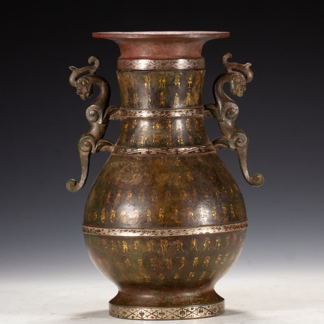 A Han Dynasty vase inlaid with gold and silver (1 of 8)