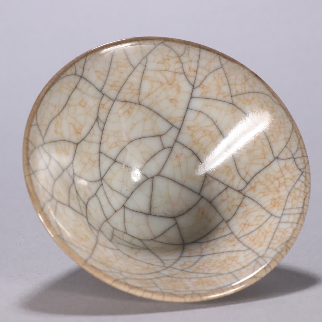 One is a Song Dynasty Ge kiln tea bowl - 8