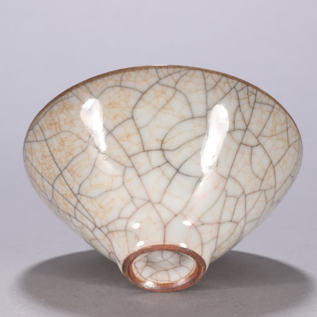 One is a Song Dynasty Ge kiln tea bowl - 9