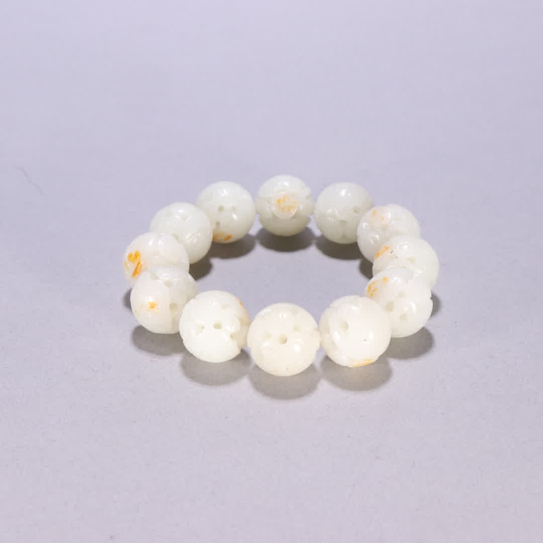 A Qing Dynasty Hetian jade seed material round longevity pattern bracelet: Qing Dynasty Hetian jade seed material Tuanshou pattern bracelet SIZE: Bead diameter 1.9cm W: 106g (The Dimensions Of All Batches Are Manually Measured.If You Need More Detailed Information, Please Co