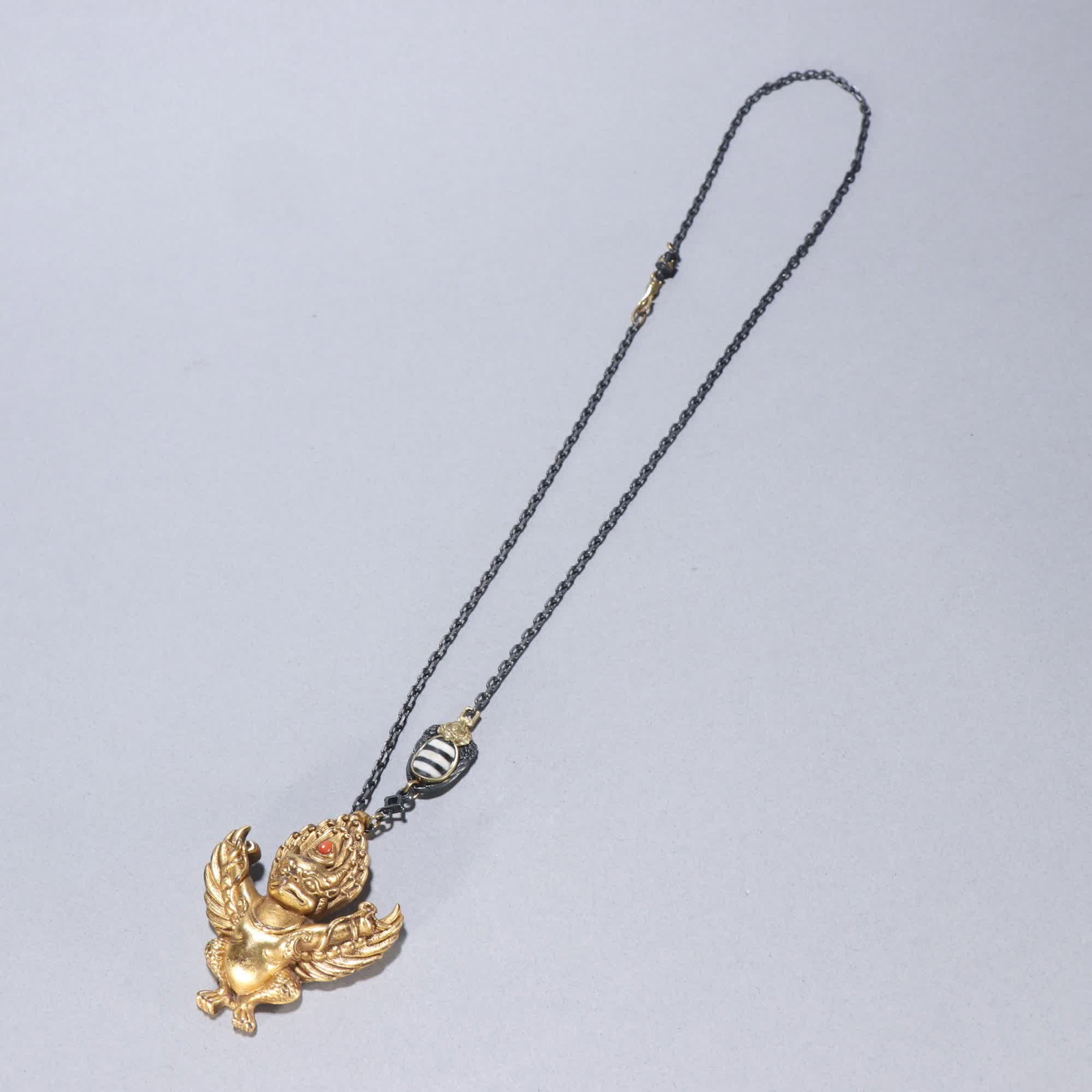 A gilt bronze roc bird pendant: Bronze gilt pendant of the great roc bird SIZE: H:6cm W:5cm W:48.9g (The Dimensions Of All Batches Are Manually Measured.If You Need More Detailed Information, Please Contact Our Customer Service Befo
