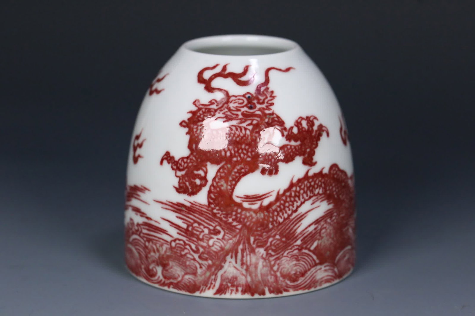 A Qing Qianlong period underglaze red carp dragon motif water vessel (1 of 9)