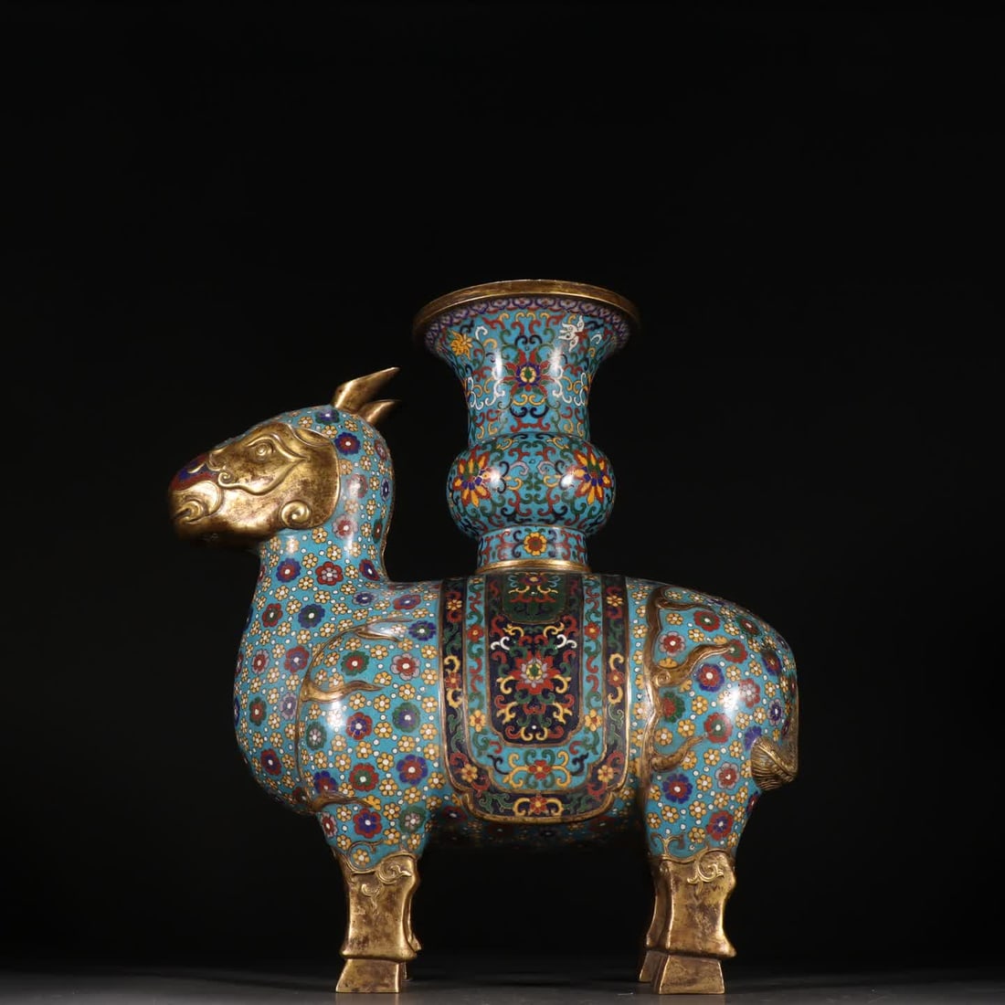 A Qing Dynasty bronze-bodied cloisonne rhinoceros wine vessel: Qing Dynasty bronze-bodied cloisonne rhinoceros wine vessel SIZE: H:31.5cm W:28.8cm W:2110.4g (The Dimensions Of All Batches Are Manually Measured.If You Need More Detailed Information, Please Contact