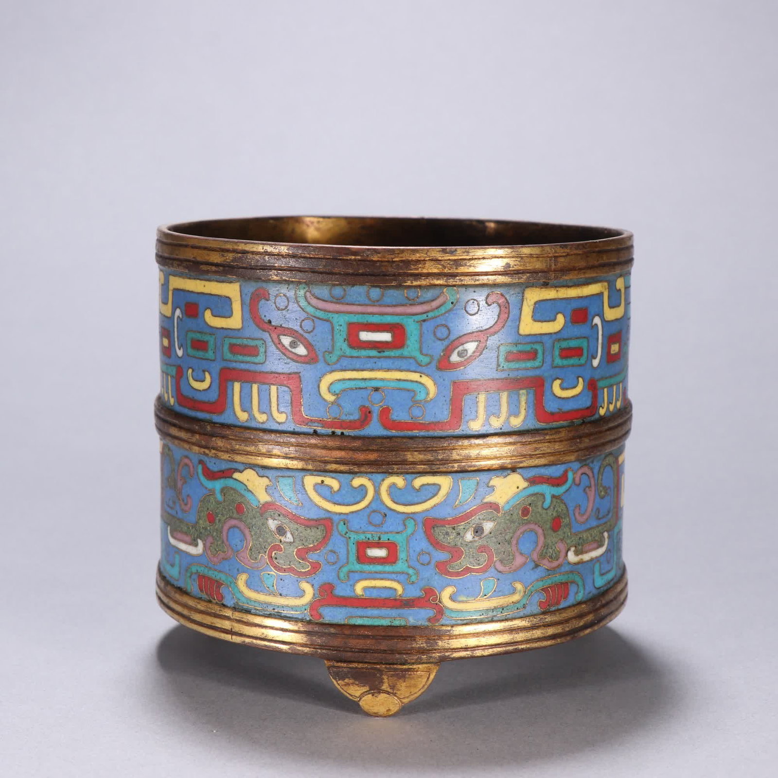 A Qing Dynasty bronze gilt cloisonne three-legged incense burner with dragon motif: Qing Dynasty bronze gilt cloisonne dragon pattern three-legged incense burner SIZE: H:9.7cm W:10.6cm W:566g (The Dimensions Of All Batches Are Manually Measured.If You Need More Detailed Information, 