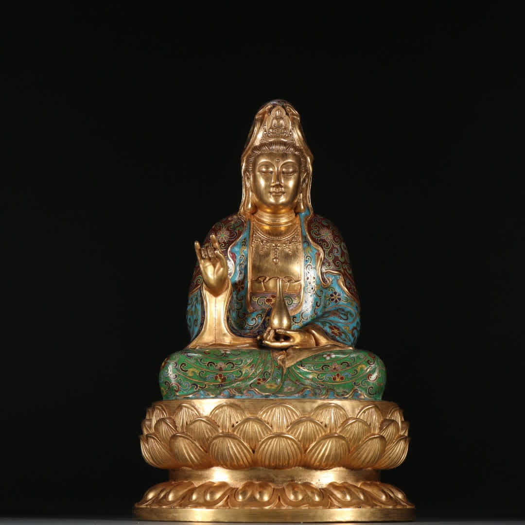 A gilt bronze cloisonne seated Guanyin statue: Gilt bronze cloisonne seated Guanyin statue SIZE: H:22.6cm W:13.8cm W:1157.3g (The Dimensions Of All Batches Are Manually Measured.If You Need More Detailed Information, Please Contact Our Customer Se