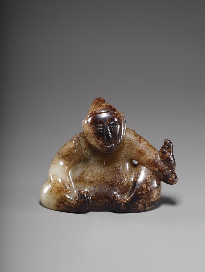 A Hetian jade Hu Ren ornament: Hetian jade Hu people ornaments SIZE: 8.5x4.5x7cm W:246.6g (The Dimensions Of All Batches Are Manually Measured.If You Need More Detailed Information, Please Contact Our Customer Service Before Biddin