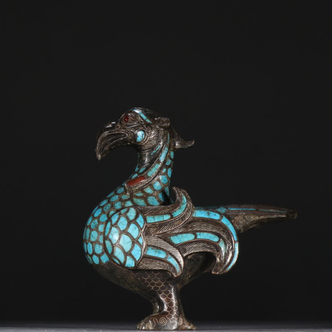 A Han Dynasty bronze inlaid with silver inlaid turquoise phoenix ornament: Han Dynasty bronze inlaid with silver inlaid turquoise phoenix ornaments SIZE: H:12.3cm W:12cm W:475.2g (The Dimensions Of All Batches Are Manually Measured.If You Need More Detailed Information, Plea
