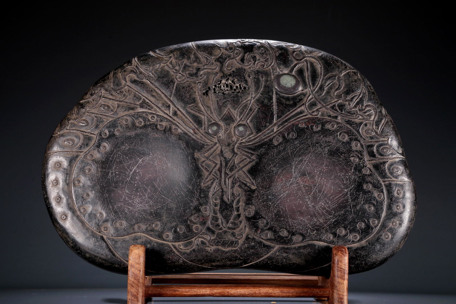 A Wonderful Stone 'Fruit' Duan-Type Inkstone: A Wonderful Stone 'Fruit' Duan-Type Inkstone. Incised with stone bosses and winding stalks. Chinese Qing Dynasty. Mark Of Zhang Zhao. Size:31cmx19.5cmx2.5cm