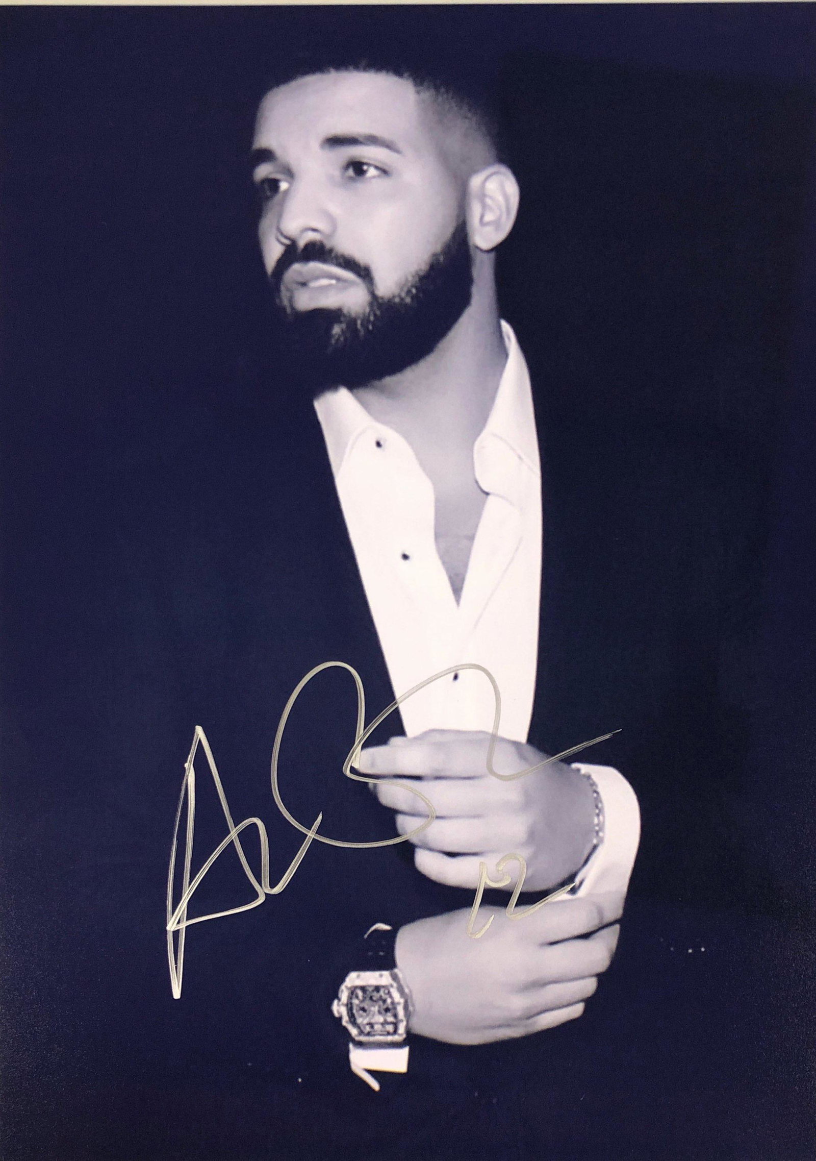 Drake Signed Photo: Autographed by:DrakeAuthentication Code: PC26407Unframed Vertified and Excellent Condition Please read our terms before placing bids.