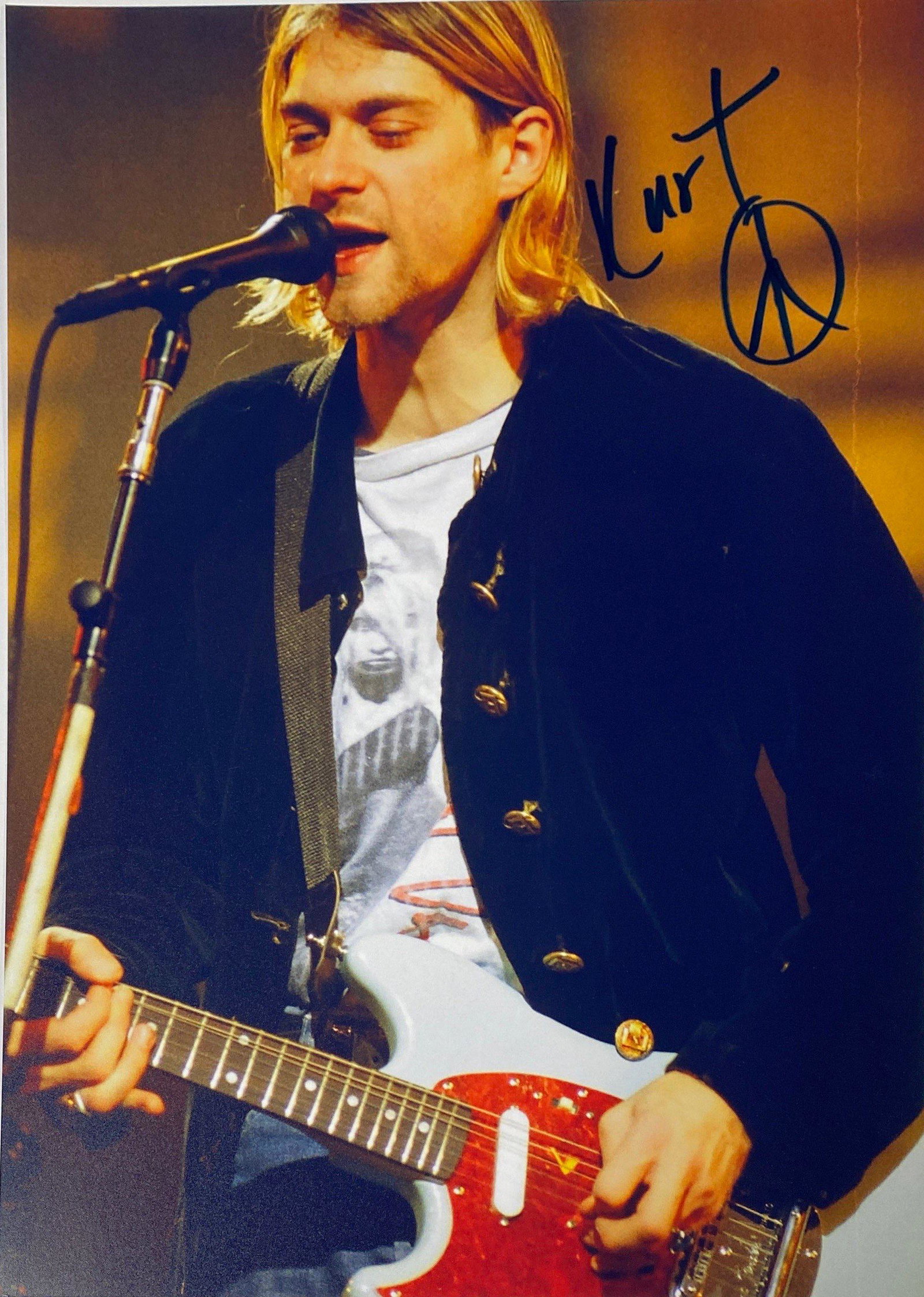 Signed Kurt Cobain Photo: Autograph By : Kurt CobainSize : 8"x 10"Unframed Authenticated and Excellent ConditionPlease reas our terms before placing bids.