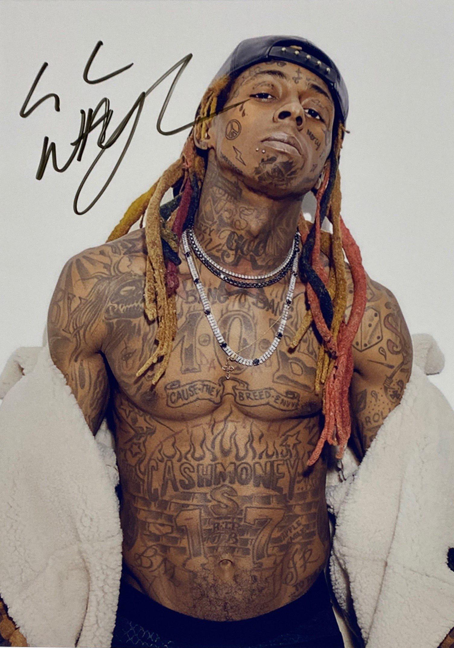 Autograph Signed Lil Wayne Photo: Autographed by:Lil WayneSize : 8" x 10"Excellent Condition and Certified.Please reas our terms before placing bids.