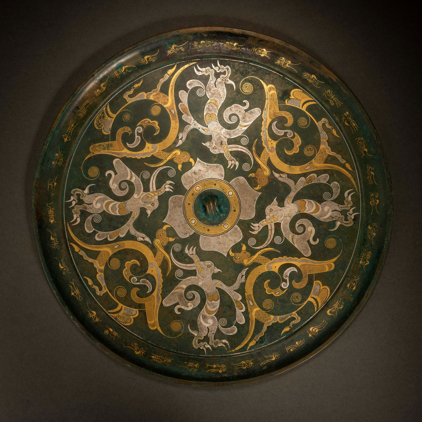 Han Dynasty bronze mirror with gold and silver phoenix pattern (1 of 7)