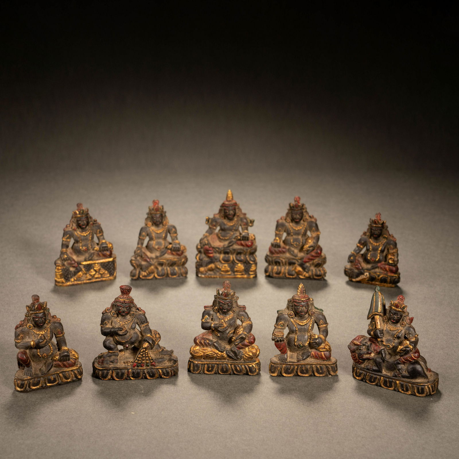 Qing Dynasty coal spar stone depicting gold treasure king seated statue (1 of 10)