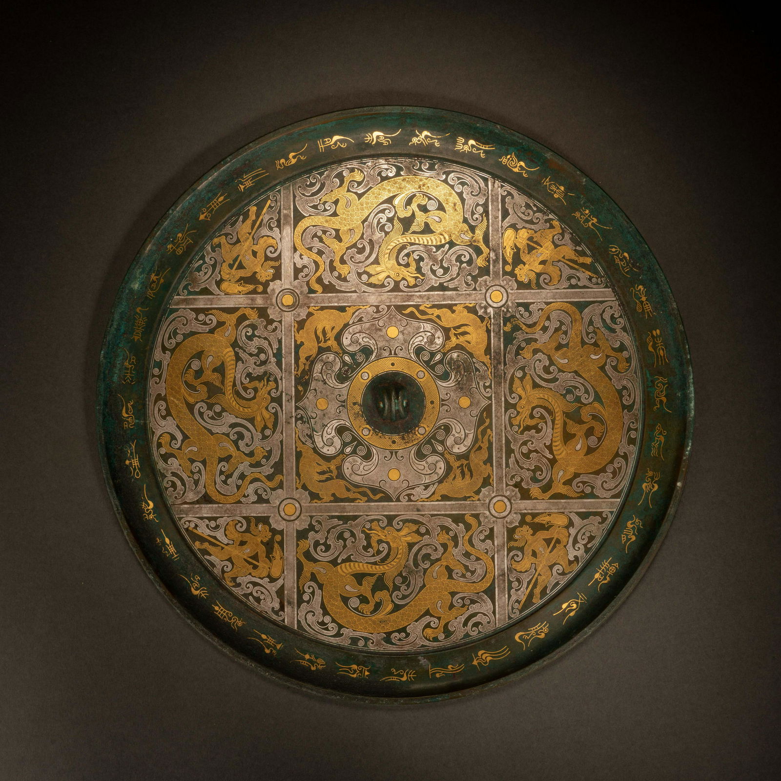 Han Dynasty bronze mirror with gold and silver dragon pattern (1 of 8)