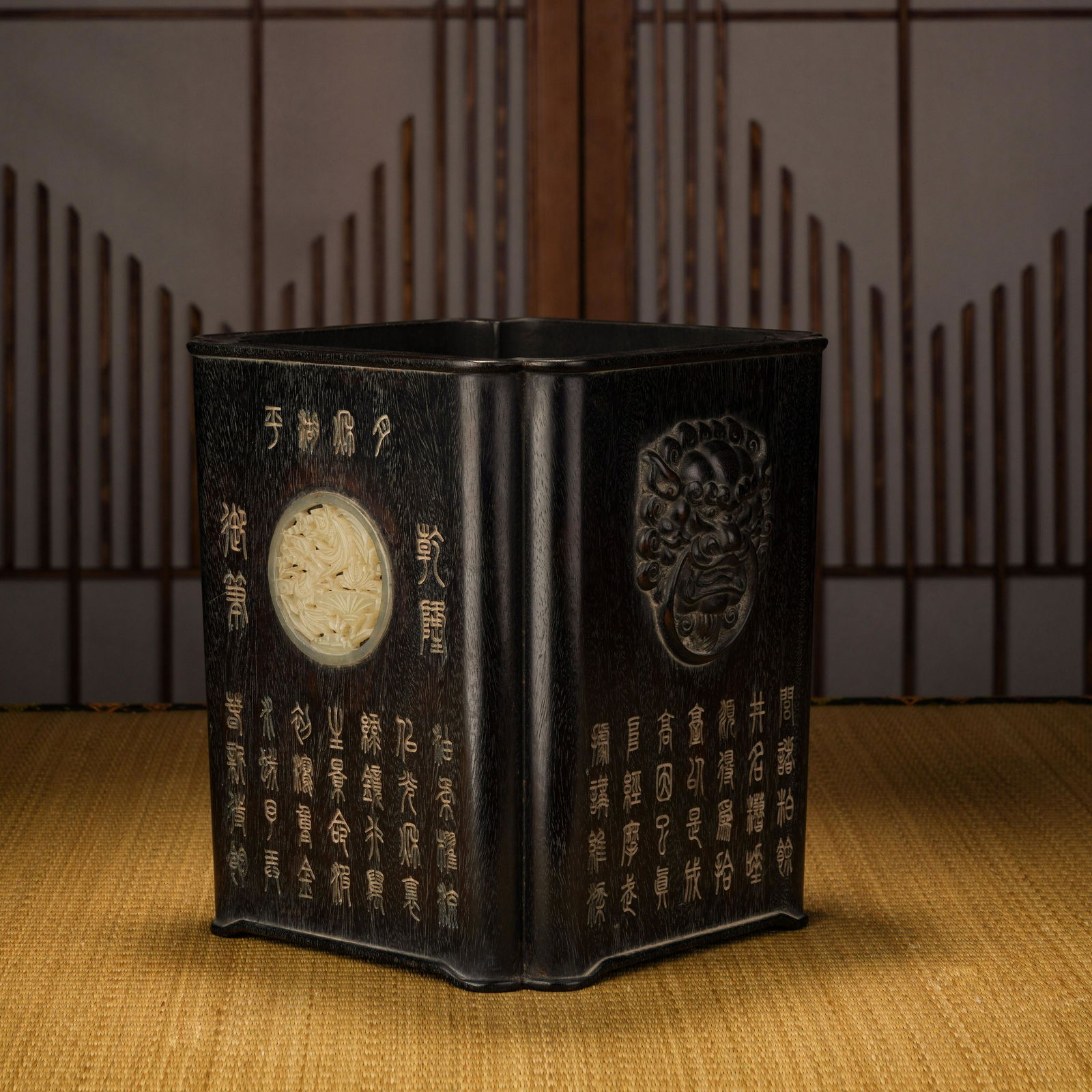 A Qing Dynasty Red Sandalwood Inlaid Hetian Jade Animal Face Pattern Pen Holder (1 of 9)