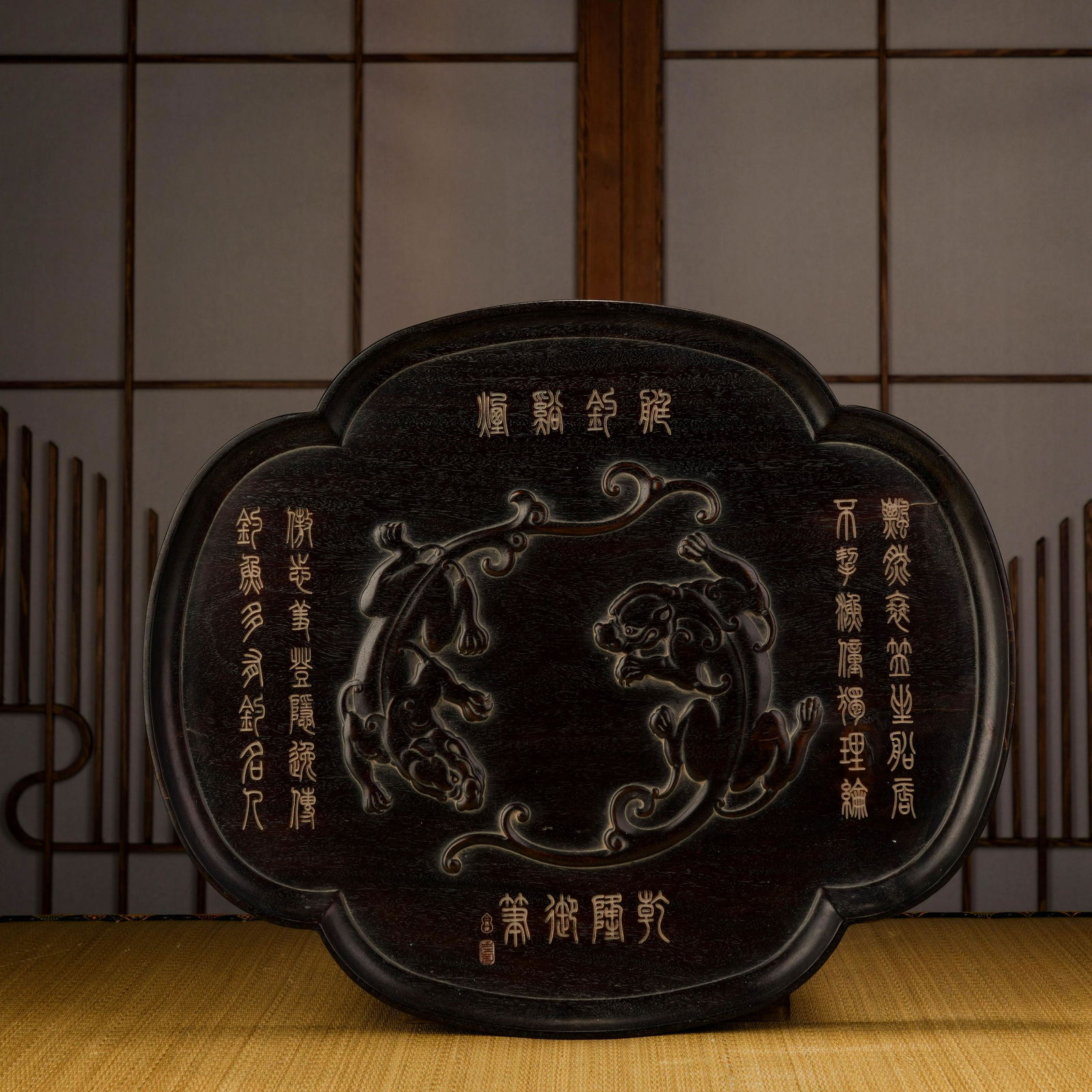 A qing dynasty red sandalwood qianlong imperial pen animal pattern plate (1 of 9)