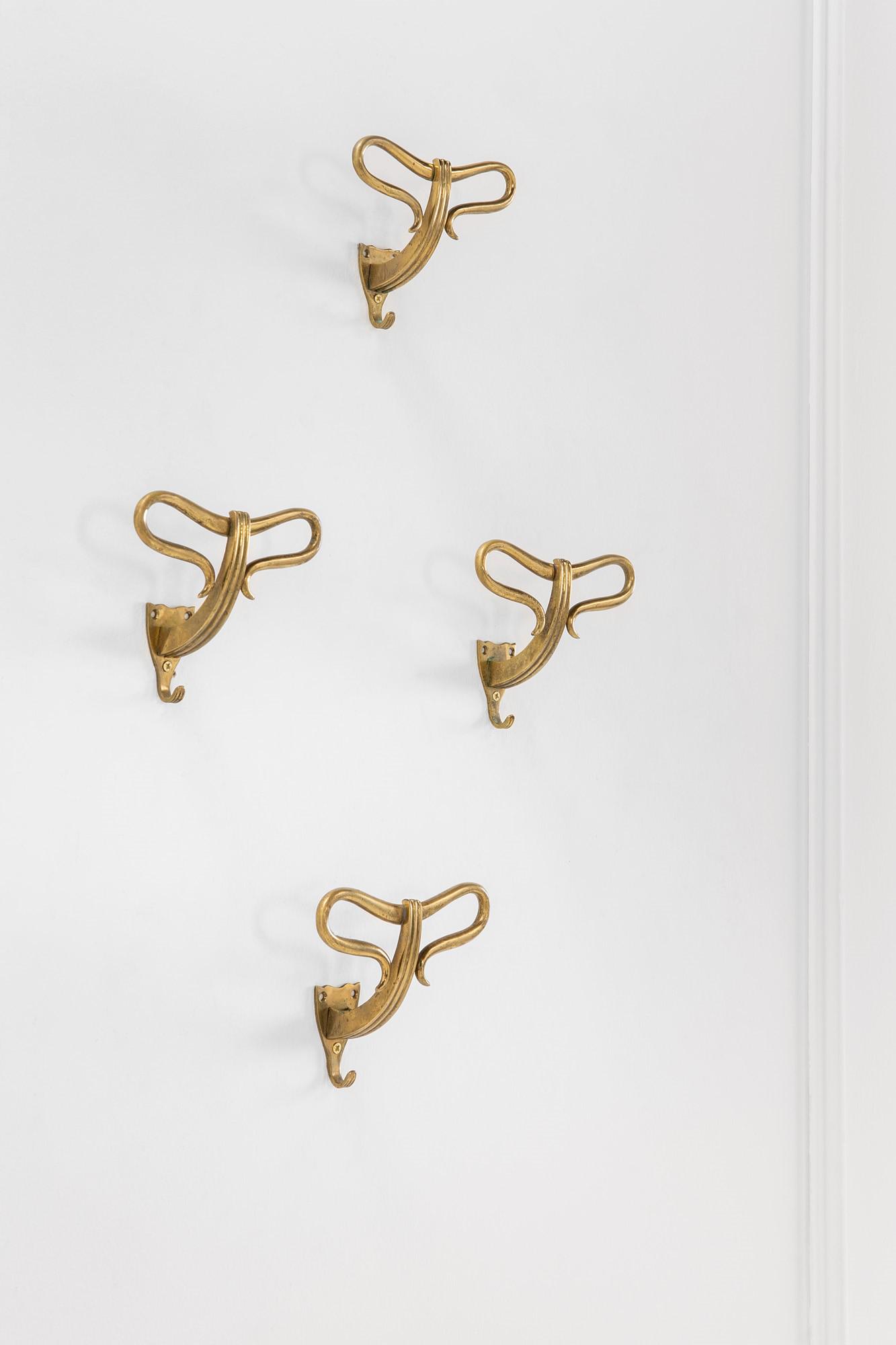 Carlo Enrico Rava (attr.), Carlo Enrico Rava, quattro appendiabiti in fusione di ottone (1 of 3)